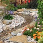 Tips voor het plaatsen van kiezelstenen in de tuin